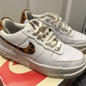 White/leopard print Air Force 1’s.